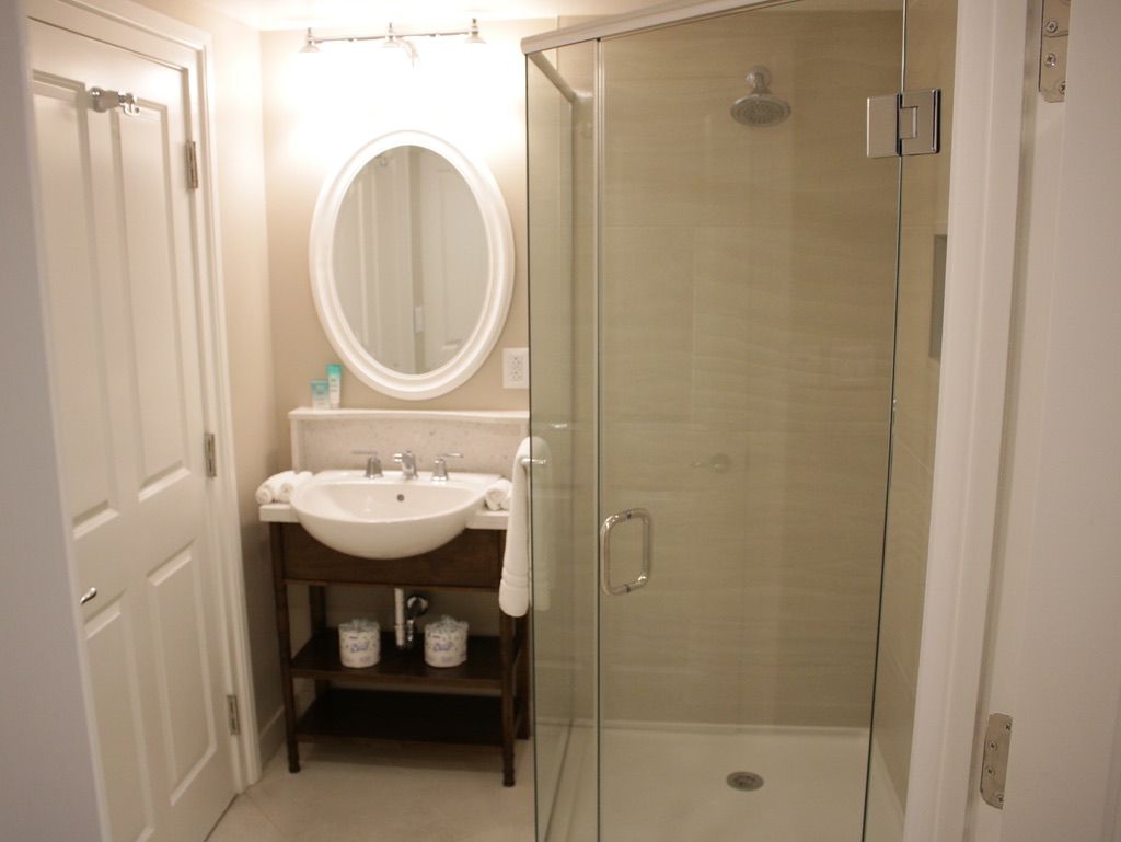 Second vanity and shower stall