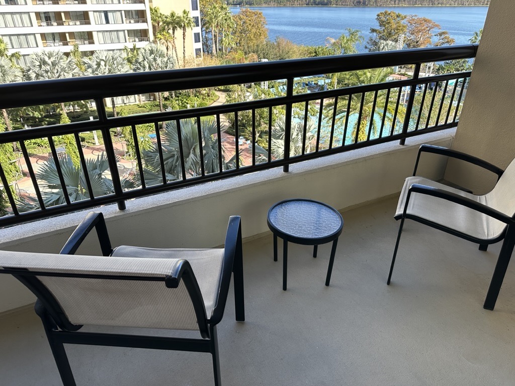 Balcony with table and two chairs