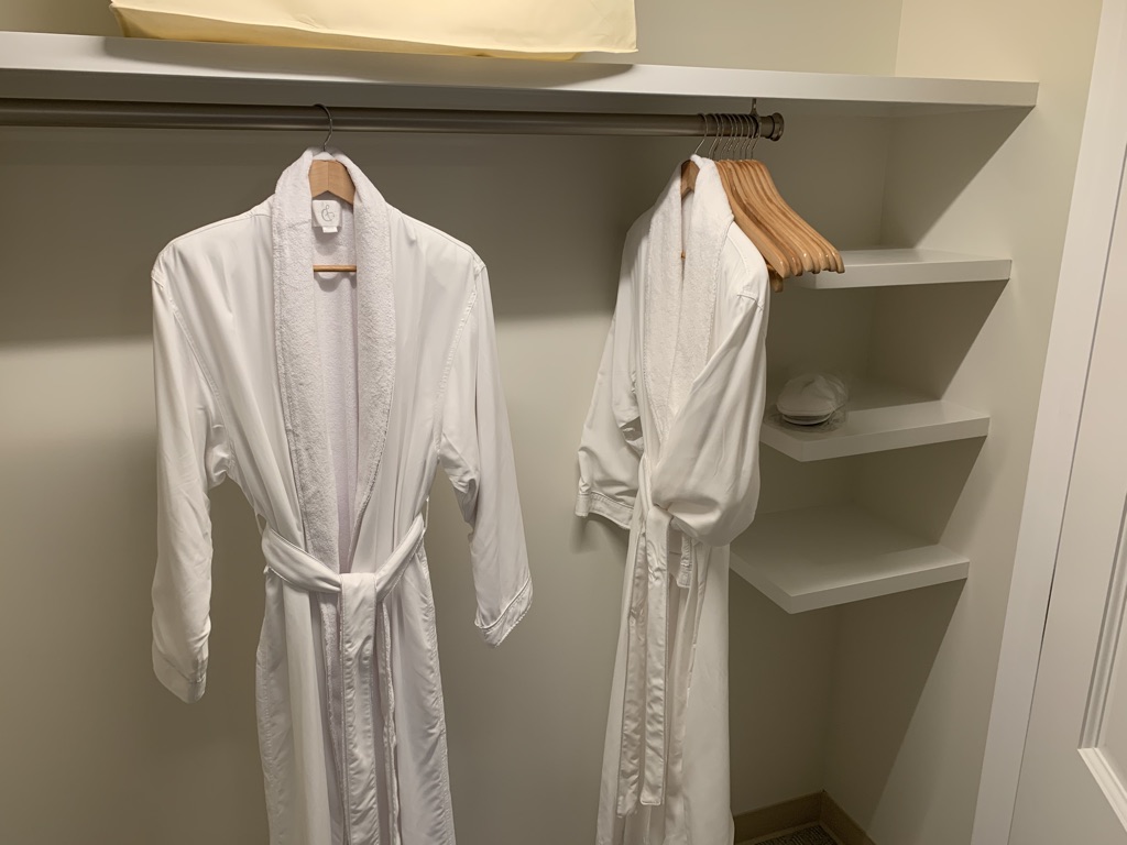 Master bedroom closet with robes