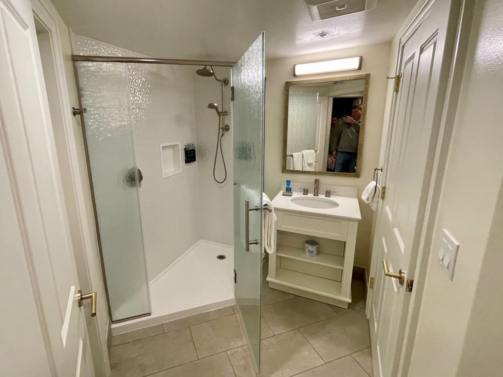 Split bathroom shower and vanity