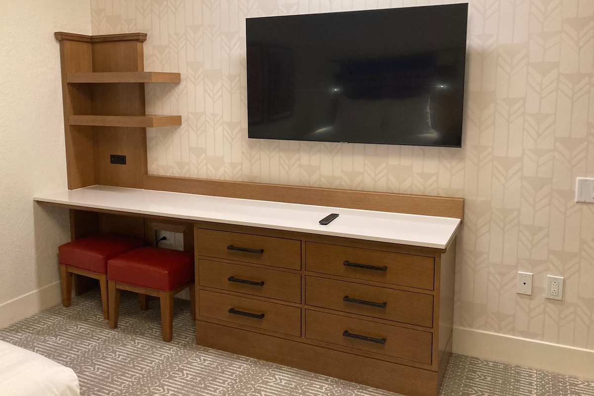Bureau and entertainment center with two stools